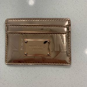 Michael Kors rose gold card holder